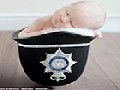 Policeman’s Four-Day-Old Daughter Sleeping in His Helmet