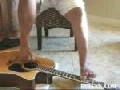 http://www.bofunk.com/video/7059/armless_guitar_toe_jam.html