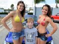 http://www.collegehumor.com/picture/6498703/little-kid-with-hot-car-girls