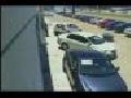 Runaway Tire Slams Into Parked Car