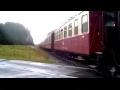 Steam Train of the HSB blows the Horn in the Rain in Benneck