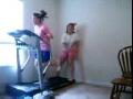 2 girls on a treadmill
