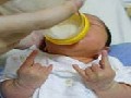/fc3c4ec3d7-funny-fingers-expressions-of-baby-drinking-milk