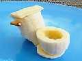 /eaeb397c0d-banana-carved-in-the-shape-of-toilet