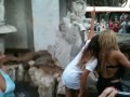 Shakira is dancing in a fountain