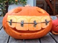 /19a420c5b3-pumpkin-with-giant-teeth-braces