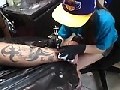 http://www.mauskabel.com/hosted-id7641-young-tattoo-artist.html