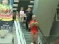 /c474b89c96-pantless-on-an-escalator