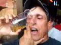 Guy drinks beer through nose