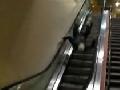 /72ad1b11f2-massive-escalator-leap-and-faceplant