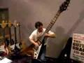 Dude rocks out on a monster sized Flying V guitar