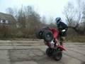/122e53b001-atv-ride-stunt
