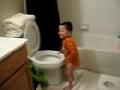 toddler dunks head in toilet