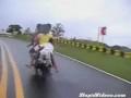 /c255a379f6-whole-family-riding-on-one-moped