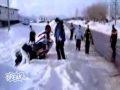/ef520dcb85-snowmobile-road-jump-faceplant-winter-fails