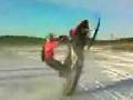 /59bb35387f-cool-snowmobile-wheelie-stunt