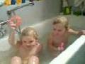 Children in bath singing