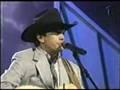 /92c322caff-george-strait-live-blue-clear-sky