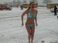 /15b241256d-girls-make-snow-angels-in-bikinis